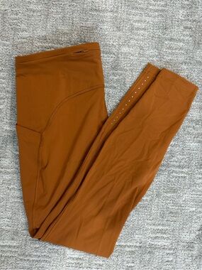 Lululemon Swift Speed Rust Orange Performance Leggings 28” size 12